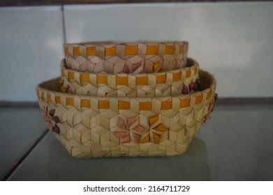 Beka, a woven bowl or plate made of palm leaf used by one of Flores tribe, Ngada. The color of the decoration is natural dye colors.