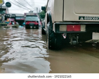 Bekasi, Indonesia - February 20th, 2021 - A Car That Is Stuck In A Flood