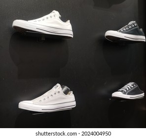 Bekasi, Indonesia - June 27, 2020: Black And White Converse Sneakers Hanging On The Wall