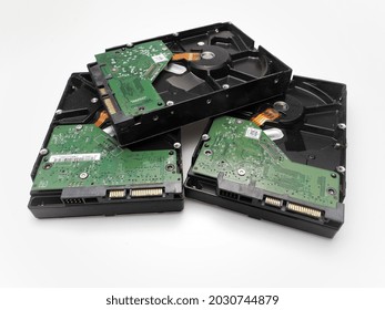 Bekasi, West Java - Indonesia  August 24th 2021 : Hard Disc Drives Turn Up Side Down Showing The HDD Board 