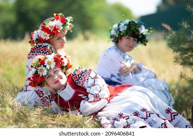 Belarus, Aftyuki Village, July 31, 2021. Ethnic Holiday. Beautiful Belarus Or Ukrainian Women In National Clothes.