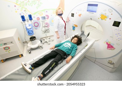 Belarus, City Of Gomil, May 31, 2021. A Child Lies In An MRI Machine. A Boy In A Magnetic Resonance Imaging Machine In A Hospital.