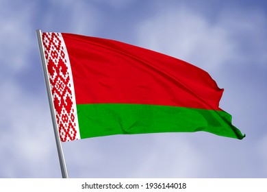 Belarus flag isolated on sky background. close up waving flag of Belarus. flag symbols of Belarus.