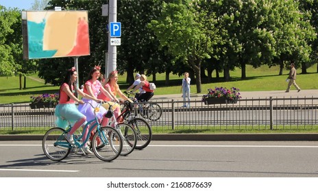 Belarus, Minsk, 18.05.2019 . Cyclocross In Different Masquerade And Tracksuits