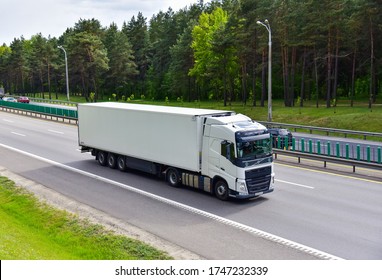 BELARUS, MINSK - JUN 01, 2020: VOLVO FH 460 refrigerator truck with Semi-trailer driving along highway. Goods Delivery by roads. Services and Transport logistics
