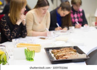 Belarus, Minsk, March 21, 2017. Culinary School. An Open Lesson On French Cooking.People In The Master Class For Cooking. Learn To Cook