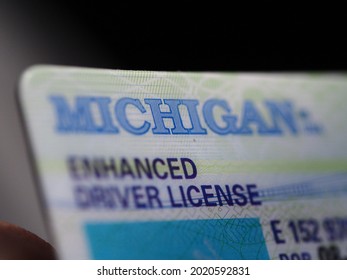 Belarus,minsk,2021.Michigan American Driver's License In The Hands Of A Police Officer At Check