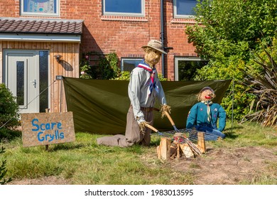 Belbroughton, UK, September 21, 2019 - Boy Scout Scarecrows Cooking Burgers At Their Campsite. One Of The Many Exhibits Made And Displayed By Local Residents For The Belbroughton Scarecrow Festival.