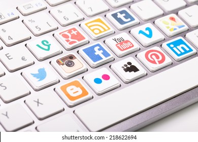 BELCHATOW, POLAND - AUGUST 31, 2014: A Social Media Logotype Collection Printed And Placed On Modern Computer Keyboard.