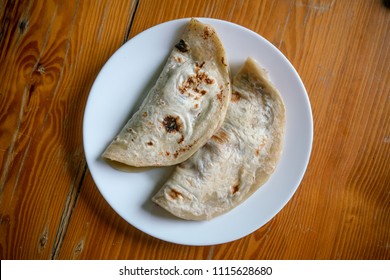 Beleadas - Traditional Honduran Food of Flour Tortilla with Beans, Cheese and Egg / Above View