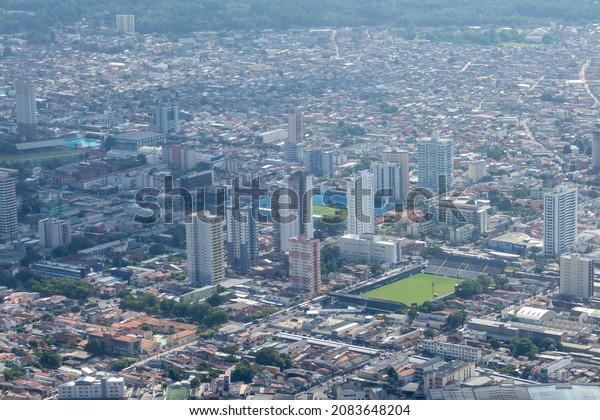Belem, Para, Brazil - Nov\
12, 2021: Aerial photo of the urban center of Belem, Para state,\
Brazil. View of the stadiums of the soccer teams of Remo and\
Paysandu (partial).