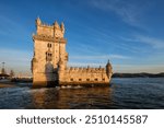 Belem Tower or Tower of St Vincent - famous tourist landmark of Lisboa and tourism attraction - on the bank of the Tagus River Tejo on sunset. Lisbon, Portugal