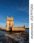 Belem Tower or Tower of St Vincent - famous tourist landmark of Lisboa and tourism attraction - on the bank of the Tagus River Tejo on sunset. Lisbon, Portugal