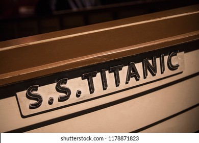 Belfast, Northern Ireland - August 23rd 2018: Close-up view of the S.S. Titanic name on a replica lifeboat at the Titanic Belfast Museum.