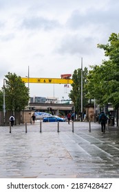 Belfast, Northern Ireland - June 8 2022: Belfast Cityscape With A View Of A Famous HW Yellow Crane