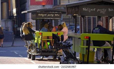 Belfast Party Bike In The City Center - BELFAST, UNITED KINGDOM - APRIL 25, 2022