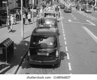 BELFAST, UK - CIRCA JUNE 2018: View Of The City Of Belfast With Black Taxi Cabs In Black And White