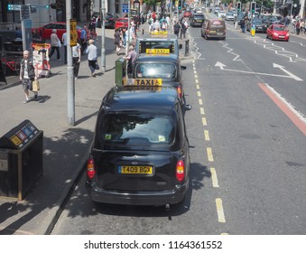 BELFAST, UK - CIRCA JUNE 2018: View Of The City Of Belfast With Black Taxi Cabs