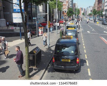 BELFAST, UK - CIRCA JUNE 2018: View Of The City Of Belfast With Black Taxi Cabs