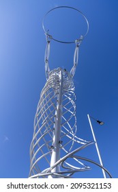 BELFAST, UNITED KINGDOM - Oct 04, 2021: A Vertical Shot Of A Modern Art Installation In Belfast Called The Beacon Of Hope Nicknamed The Thing With A Ring 