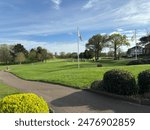 The Belfry golf course in England. View of the course and flags. Blue sky and sunshine.