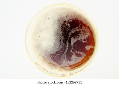 Belgian Brown Beer In A Gold Rim Glass From Above 