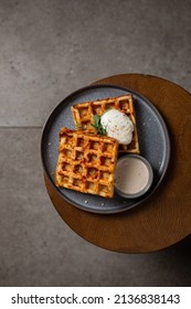 Belgian Cheese Waffles With Poached Egg And Sauce