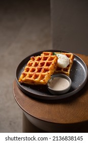 Belgian Cheese Waffles With Poached Egg And Sauce