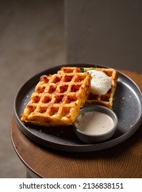 Belgian Cheese Waffles With Poached Egg And Sauce