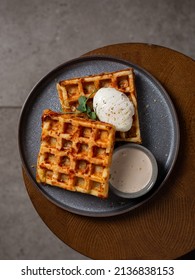 Belgian Cheese Waffles With Poached Egg And Sauce