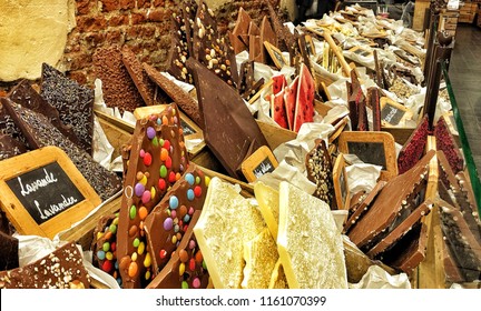 Belgian chocolate in a traditional chocolate shop in Brussels, Belgium with white, black and colorful chocolate bars