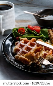 Belgian Waffle Breakfast Served With Sausage Eggs And Coffee