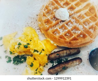 Belgian Waffle With Scrambled Eggs And Two Turkey Sausage Links