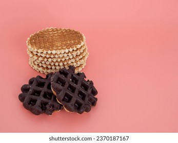 Belgian waffles on a pink background. Belgian waffles close up. - Shutterstock ID 2370187167