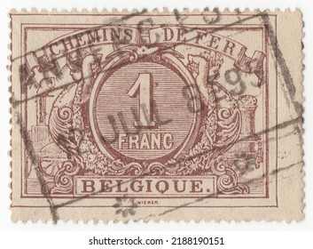 BELGIUM - CIRCA 1882: An Old Canceled Lavender 1 Frank Railway Official Stamp. Numerals In Frame With Steam Locomotive And Ornament