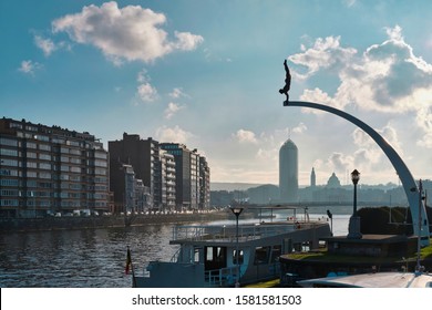 Liège, Belgium - December 05, 2019: Panoramic View Of River Meuse With Many Of The Landmarks The Belgian City Offers: The Diver, The Paradise Skyscraper, The War Memorial Monument, Etc. 