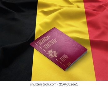 Belgium passport on the top of an satin national flag