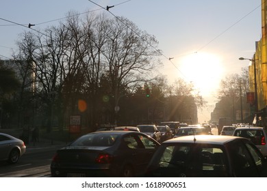 Belgrade, Serbia, 12.16.2019.
Beautiful Golden Sunset  And Traffic Jams On Belgrade Streets Under Heavy Pollution.
