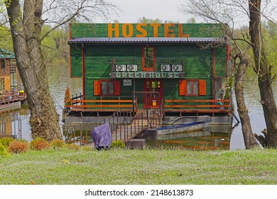 Belgrade, Serbia - April 4, 2018: Hostel green house floating pontoon at Danube river New Belgrade.