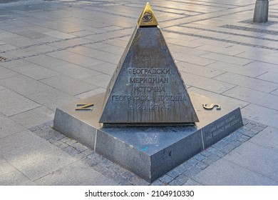 Belgrade, Serbia - August 08, 2021: Bronze Pyramid With Latitude And Longitude Coordinates Landmark At City Centre.