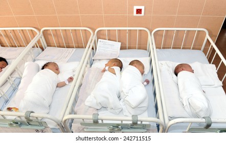 BELGRADE, SERBIA - CIRCA DECEMBER 2014: Unidentified new born babies in maternity hospital, circa December 2014 in Belgrade