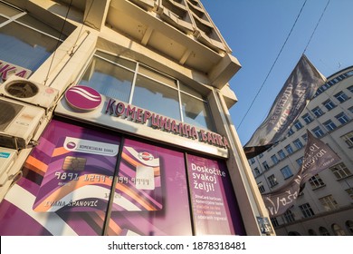 BELGRADE, SERBIA - DECEMBER 6, 2020: Komercijalna Banka logo on their local branch in Belgrade advertising for Dinacard. Currently being privatized, Komercijalna Banka is Serbian a commercial bank