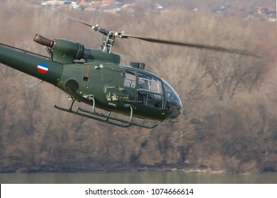 BELGRADE, SERBIA, FEBRUARY 2007; Serbian Air Force Soko Aerospatiale (now Airbus Helicopters) SA341 Gazelle Gama Light Attack Helicopter In Flight Over River During 'Sretenje 2007' Military Exercise