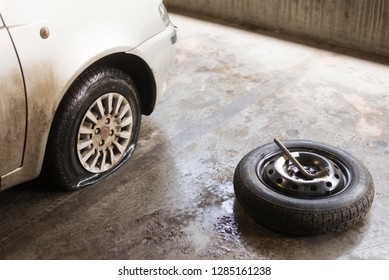 BELGRADE, SERBIA - JANUARY 14 2019 : Car Flat Tyre Replacement.Pirelli Spare Tyre.Vehicle Wheel Service.