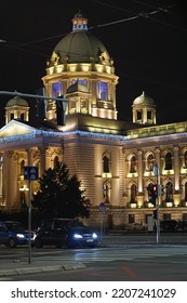 Belgrade, Serbia - January 16, 2016: Serbian Parliament Government Building At Winter Night With Holiday Lights On Decor.