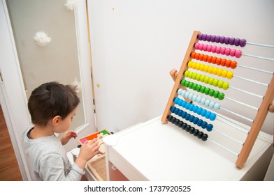 Belgrade, Serbia - January 2020: Children is playing with colorful wooden didactic toys at kindergarten - Shutterstock ID 1737920525