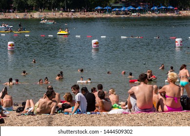 Belgrade, Serbia - June 30, 2019: Busy Day On Ada Ciganlija, Popular Outdoor Area In Belgrade, On A Hot Summer Day. People Spending Time By The Lake.