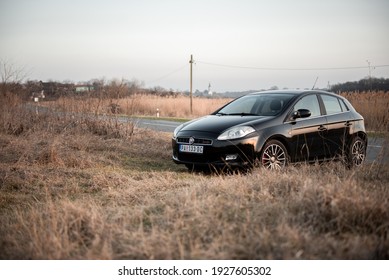 Belgrade, Serbia - March 01 2021 : Fiat Bravo Car Isolated On Rural Road.