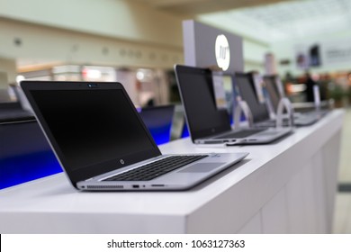 Belgrade, Serbia - March 21, 2018: New HP Laptop With Blank Screen Is Displayed On White Table In Electronic Store.