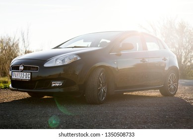 BELGRADE, SERBIA - MARCH 23 2019 : Fiat Bravo Black Car Isolated On Road.